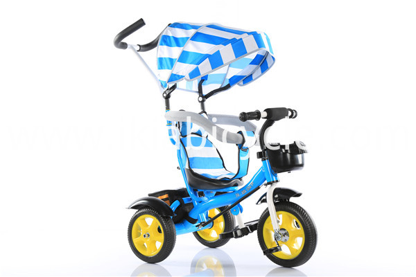 blue children tricycle with push bar