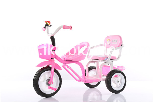 pink plastic tricycle